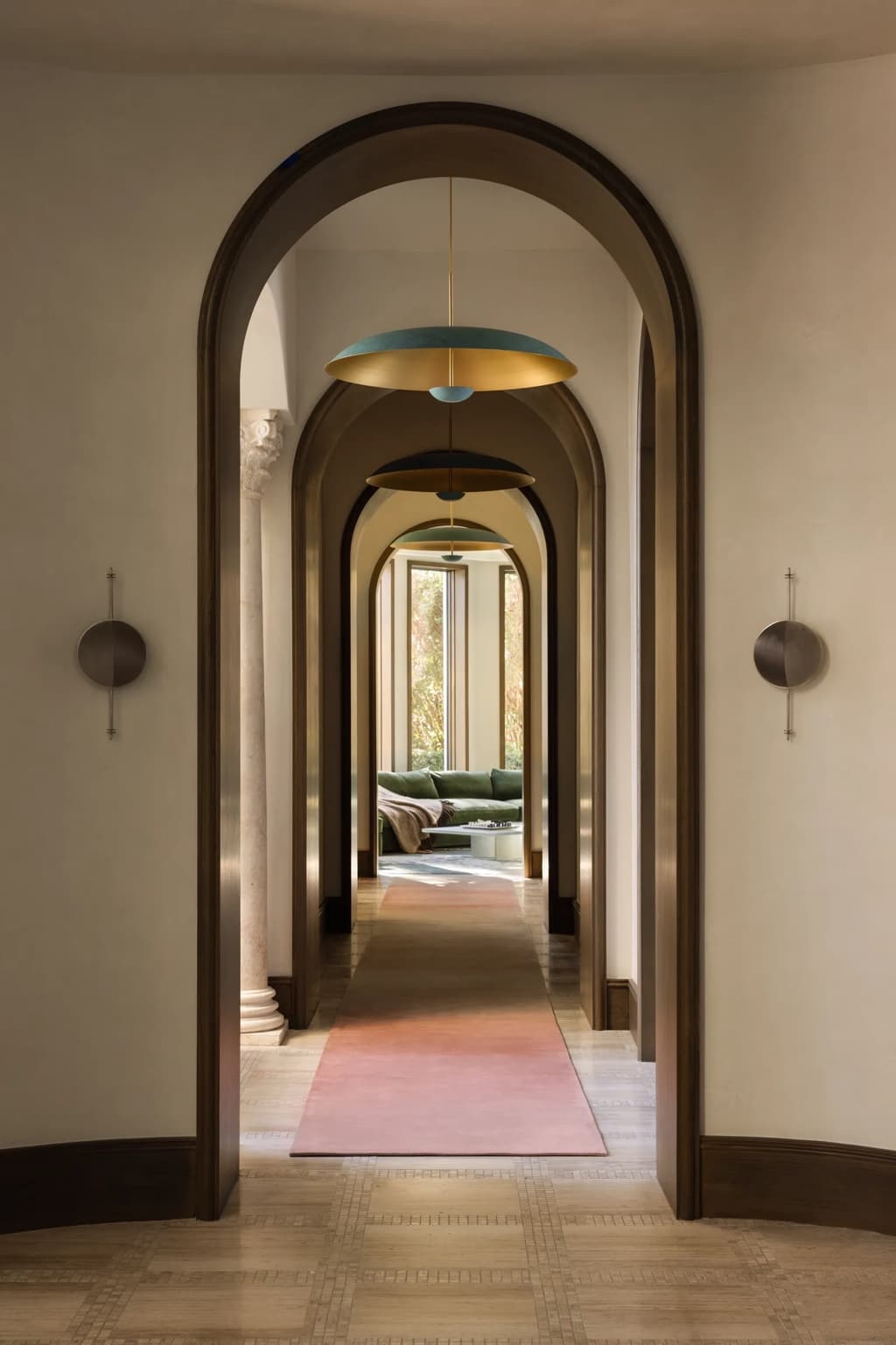 Sequence of arched plaster openings in the Florida residence